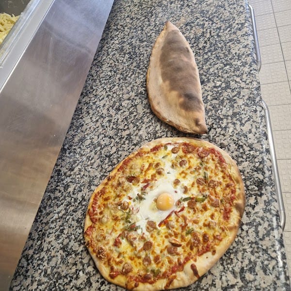 Restaurant Pizzeria La Calypsia – cuites au feu de bois à Meudon, France