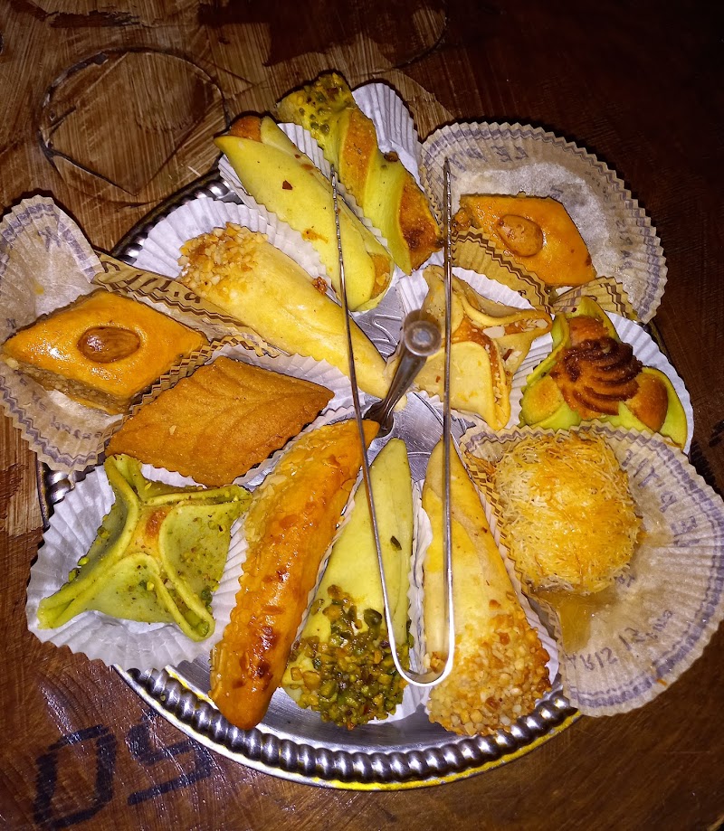 Au Petit Village — photo 1